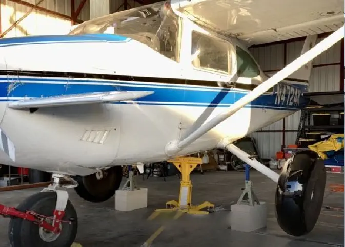 An Aircraft With Blue Color Stripes